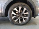 Voiture occasion RENAULT ARKANA MILD HYBRID 140 EDC EVOLUTION GRIS Hybride essence-électrique Nimes Gard #16