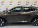 Voiture occasion FORD PUMA 1.0 FLEXIFUEL 125 mHEV S&S BVM6 TITANIUM GRIS Superéthanol-électricité Nimes Gard #3
